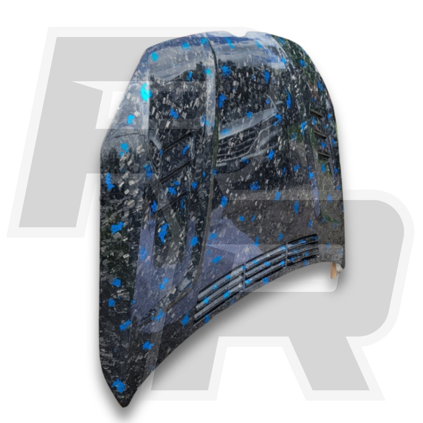 Car hood cover with blue speckles on a white background