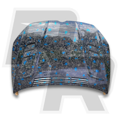 Car hood with a forged carbon fiber design on a white background