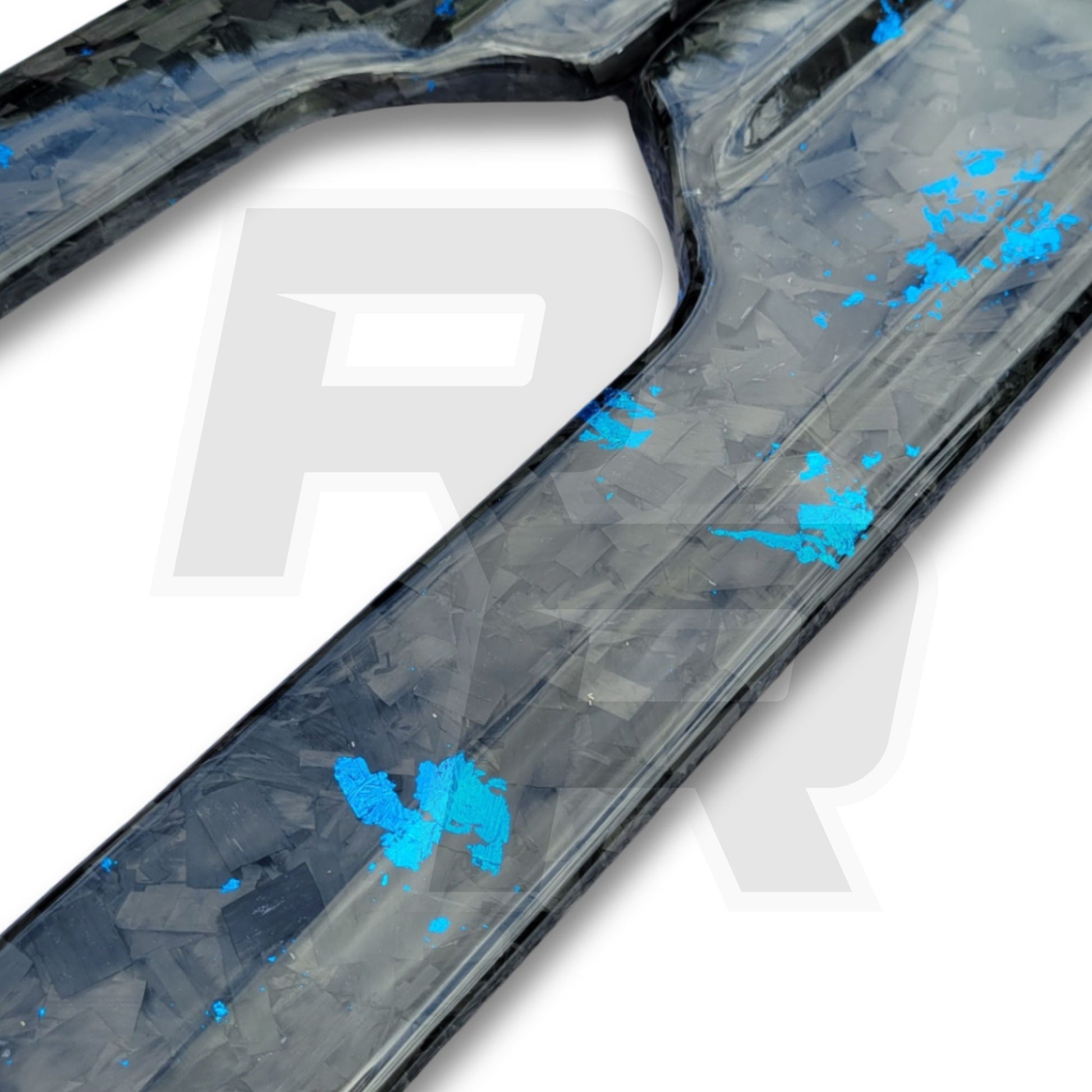 close up of blue forged carbon fiber side skirts from road rush