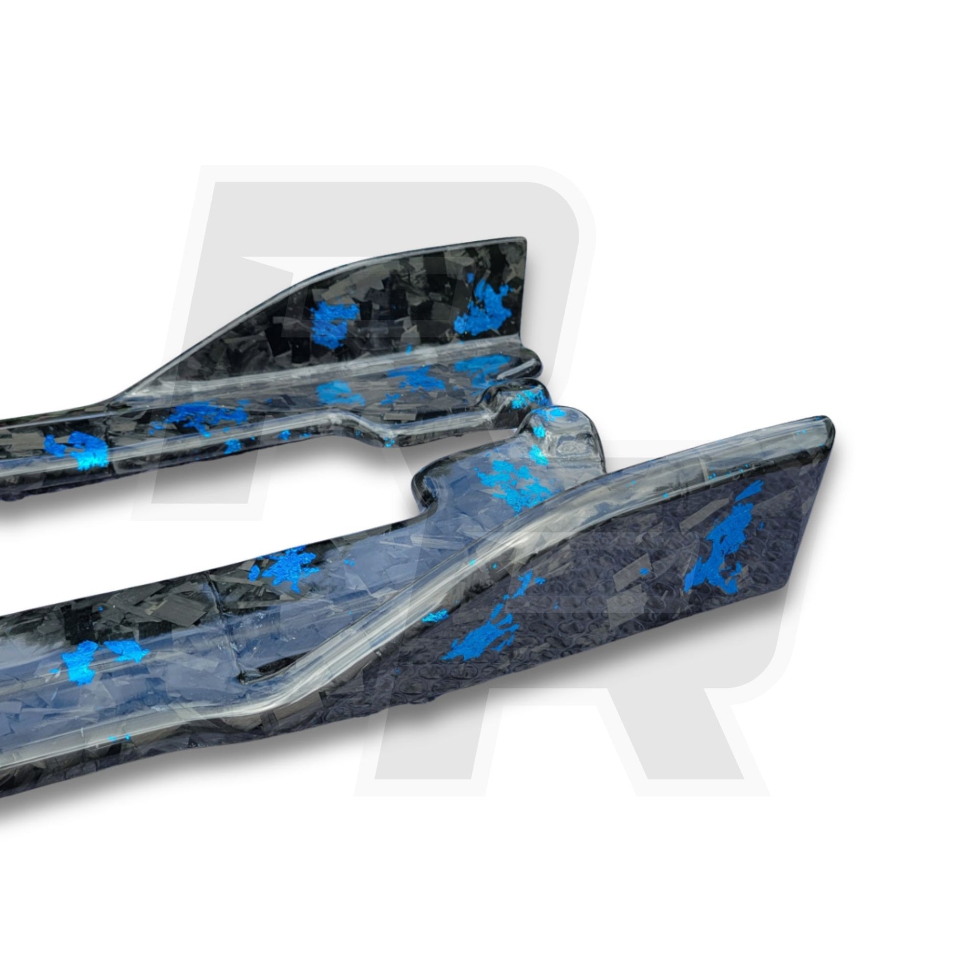 rear fins close up of carbon fiber side skirts from road rush